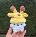 Small mushroom wearing giraffe hat